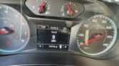 Car instrument cluster showing speedometer up to 140 mph on right and tachometer on left, with digital readout at 0 mph and mileage 114716 mi