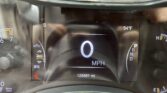 Close-up of a car dash: speedometer shows 0 MPH, outside temp 54°F, odometer 125,661 miles, gear in Park (P).