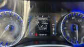Vehicle dashboard with speedometer and tachometer, central display showing 54°F, Drive mode P, Fuel Economy metrics: range 160 mi, avg 16.3 MPG, current MPG gauge, odometer 121,649 mi, blue accent lighting.