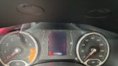 Vehicle instrument cluster showing tachometer on left, speedometer on right, central digital display and warning icons; odometer reads 111108 miles.