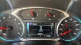 Dashboard of a car showing speedometer at 0 mph, tachometer, fuel and temperature gauges, and digital readout displaying 0 mph and 97,015 miles; gear indicator shows P R N D L.
