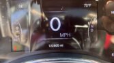 Digital car instrument cluster showing 0 mph, 70°F, and odometer at 12,2800 mi with PRND gear indicator on the right.