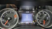 Close-up of a car dashboard: left tachometer, right speedometer, center display shows 3:39, 67°F, and 100,783 mi.