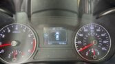 Instrument cluster with tachometer left, speedometer right, and a center display showing a car icon and mileage (79,748 mi).