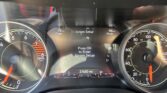 Car instrument cluster with left tachometer and right speedometer; center display shows 'Screen Setup' and 98 mi range, odometer reads 37,680 miles (P/R/N/D indicators visible).