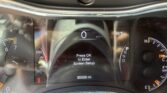 Instrument cluster with digital display: showing 0 MPH, outside temp 66°F, gear in P, odometer 85008 miles, and 'Press OK to Enter Screen Setup' message.