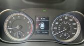 Dashboard view of a car: speedometer and tachometer with the central display showing a parked vehicle and 358 mi range; gear in Park, 100,742 mi on the odometer; outside temperature 75°F.