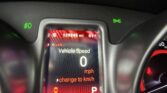 Instrument cluster showing speed 0 mph, odometer 129,245 miles, and 61° outside temperature with green fog-light indicators lit on both sides.