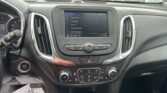 Infotainment touchscreen in car showing System menu with Time/Date, Language, Phones, Wi-Fi networks
