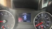 Instrument cluster view from the driver’s seat: left tachometer, right speedometer, center screen shows a car icon with gear in P, range 109 miles, outside temp 79°F, and odometer 99,569 miles.