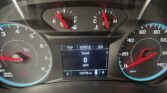 Center dashboard cluster with two round gauges (RPM left, speed right) and a digital display beneath showing trip/eco and speed 0 MPH value in the middle panel.