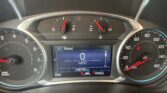 Car dashboard with speedometer reading 0 mph on a digital display and gear selected in Park (P); odometer shows 106,780 miles; fuel and temperature gauges visible.