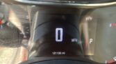 Instrument cluster showing 0 mph on the digital speedometer, outside temperature 61°F, and odometer reading 121,130 miles; partial gauges visible.