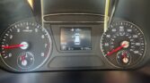 Car dashboard view with tachometer left, speedometer right, and a central display showing 128 mi range, gear in Park, and 81°F (odometer 91,790 mi).