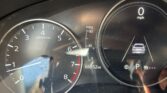 Close-up of a car dashboard showing the tachometer (rpm), the speedometer, and an odometer reading 66,352 miles; gear in Park.
