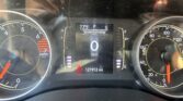 Instrument cluster showing 0 mph, 77°F, parked (P) with odometer reading 121,912 miles visible.