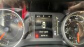 Dashboard view: central display shows 67°F, P and S, with a 'Door Open' warning and 53,795 miles on the odometer.