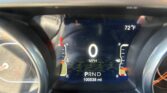 Digital instrument cluster: 0 MPH, outside temperature 72°F, gear in Park (PRND), odometer at 10,0538 miles, compass pointing South (S).