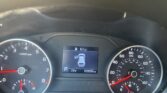 Dashboard view of a car instrument cluster: tachometer on left, speedometer on right, center display shows vehicle icon, parked (P), 73°F, 103,552 miles.