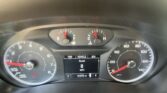Dashboard instrument cluster with analog speedometer and tachometer, red needles, and a central digital display showing speed 0 mph and 101,870 miles.
