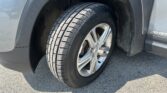 Front right wheel and tire of a GMC Terrain, showing tread and alloy rim near the wheel well.