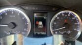 Dashboard of a car showing speedometer and tachometer, center screen with 'P' gear and a vehicle graphic, odometer 101,286 miles.