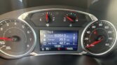 Instrument cluster with speedometer on the right and tachometer on the left, center digital display showing Trip B details and mileage (about 12,236 miles on the odometer).
