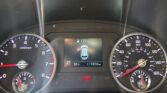 Car dashboard with speedometer and tachometer, center display shows fuel range 177 mi, odometer 11,7200 miles, gear in Park, temp 68°F.